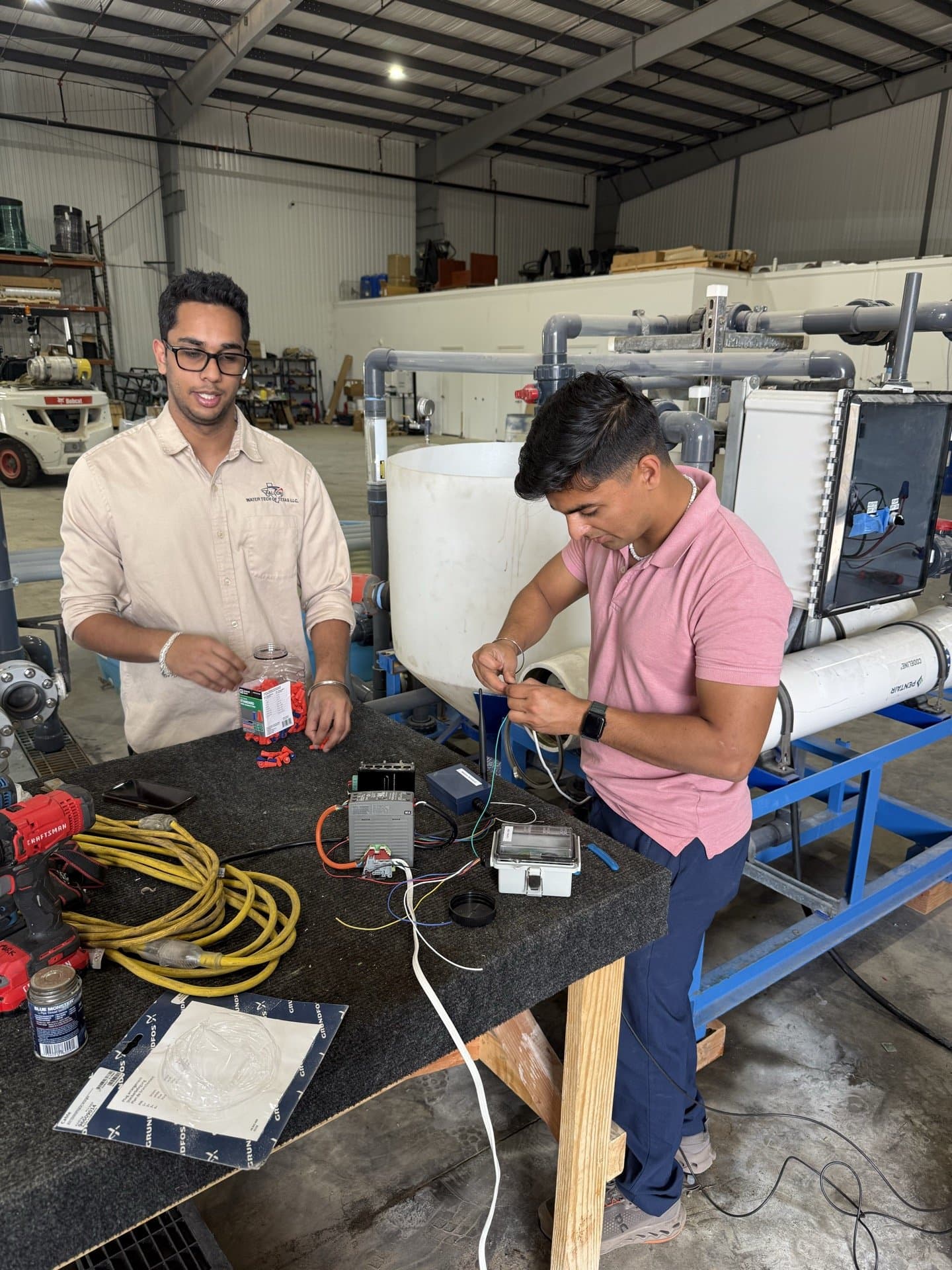 Engineers commissioning Modulink equipment at a water treatment facility